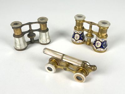 Three Pairs of Opera Glasses. Three pairs of opera glasses, including an Audemair Paris pair and 