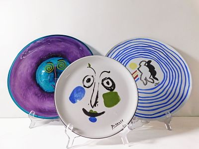 Three Decorative Plates. Three decorative plates including: 
Picasso, Face, 1963, by Masterpiece 