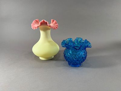 Two Fenton Vases. Two Fenton glass vaes; Burmese Rose vase with ruffled rim and a yellow body. 