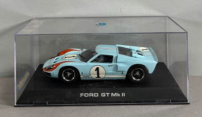 Scalextric Ford GT Mk II #1 1/32 Slot Car, with original case. Condition: 
The slot cars in this 