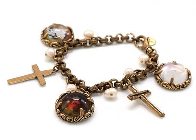 Bracciale, Alcozer &amp; JCatena ad anelli dorati con charm e finte perle.Trattasi di un capo 