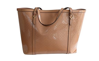 Borsa Gucci Nice Tote, in pelle Microguccissima verniciata color rosa cipria.Modello 