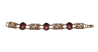 Bracciale firmato Sarah Coventryanni '60/'70caratterizzato da una struttura in metallo dorato 