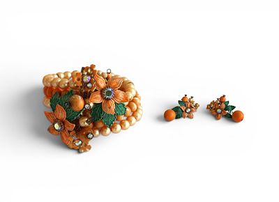 Demi parure vintagecomposta da un bracciale e un paio di orecchini. Il bracciale &egrave;composto da 