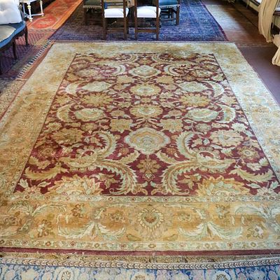 20th century - Oriental carpet. decorated with floral and plant patterns on a red and gold
