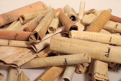 Large collection of Mezuzot, in various types of script, different sizes, and varying conditions. 