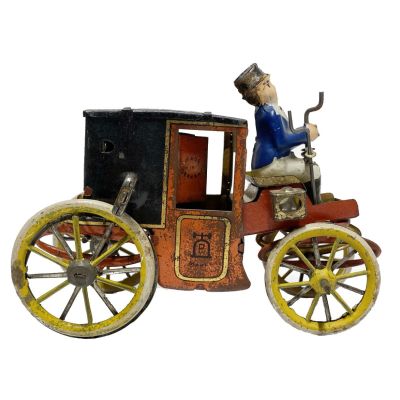 Lehmann Motor Kutsche Automobile. This iconic toy was chosen to form part of our logo.