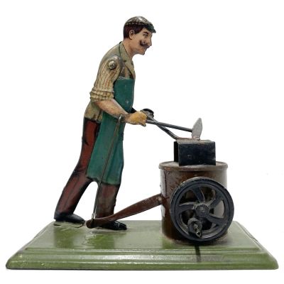 Gebruder Bing Blacksmith Automaton Circa 1914. This steam accessory could be operated by hand or 