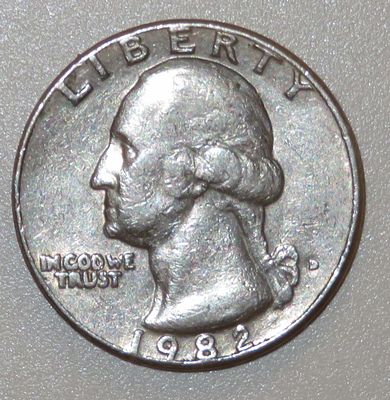 מטבע רבע דולר ארה"ב מידו הקדושה של הרבי מחב"ד. 
מטבע בערך נקוב על סך רבע דולר (קוורטר) ארה"ב 