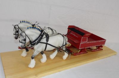 2 GREY HORSE HITCH. PULLING SLEIGH ON WOODEN PLAQUE 26 IN LONG 1-8 SCALE