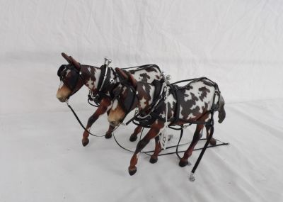 PAIR OF SPOTTED HARNESSED MULES. 1-8 SCALE