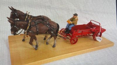 2 MULE TEAM. MCCORMICK MANURE SPREADER WITH BOX ON WOOD PLAQUE 20 IN LONG