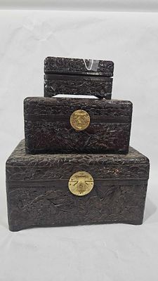Lacquered Chinese Graduated Bird Chests. Set of three with highly carved bird and floral designs