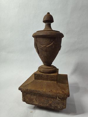 Cast Iron Finial/Topper. Decorative garland design to topper, and a mounting bracket attached to