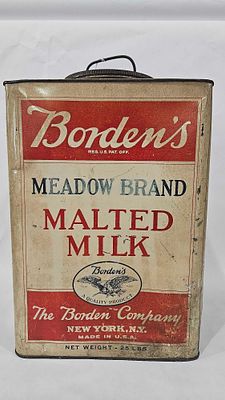 Borden's Malted Milk TIn. 14x9x9. Graphics on tin are vibrant but color has some fading.
