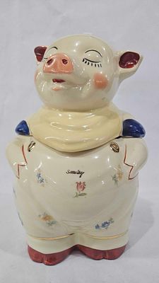 Shawnee Pottery Smiley Pig. Hairline crack to back side of top with a chip to inside rim. 11x8x6