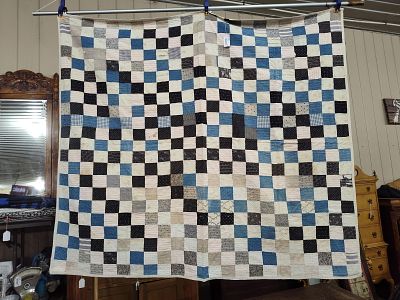 VINTAGE HAND STITCHED POSTAGE STAMP QUILT. Showing areas of soiling, thinning and wear due to