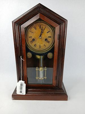 E. Ingraham steeple mantle clock. complete with key and is in running condition