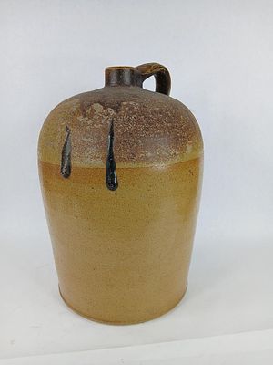 2 gallon crock jug with turkey dropping. no cracks or chips