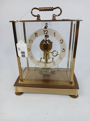 Early Kundo six jewel electromagnetic clock. in good working condition