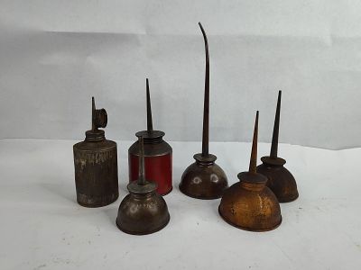 6 various oilers. includes a singer oiler singer has a hole in bottom