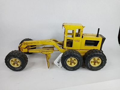 Tonka Road Grader. shows some rust but in good workable condition