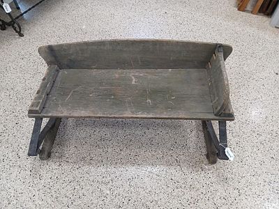 Primitive wooden springed wagon seat. 40 in wide 1 side board is missing