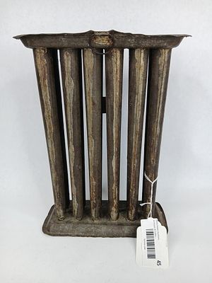 Antique tin tapered 12 candle mold. 4x8x11