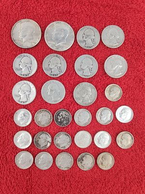 Silver quarters,halves,and dimes. total weight 4.5 oz
