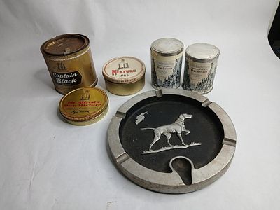 Tobacco tins and hunting dog ashtray. captain black tin is empty the rest are unopened tins