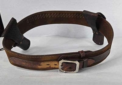 Cartridge belt with dual pistol holsters. .