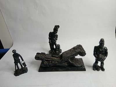 Hand carved coal miners and machine from coal. very detailed carvings a few are signed
