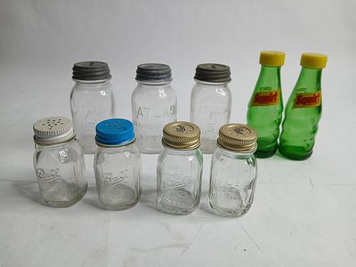 Atlas jar coin banks Ball jar and Squirt salt & pepper shakers. Includes 3 coin banks and 3 set 