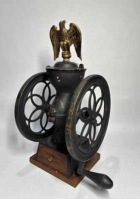 Small Enterprise coffee mill. Drawer is not original but overall is a nice small grinder. Wheels 