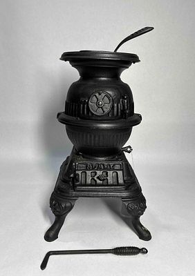 Salesman sample Spark opossum belly parlor stove. Believed to be a true salesman sample 