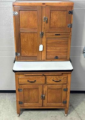 Sellers Salesman Sample Hoosier Cabinet. Porcelain top with roll top storage and 2 doors on top 