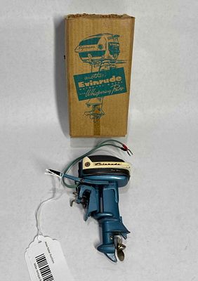 Miniature Evinrude Outboard Motor. Original box and instructions. Not tested. 5 inches tall