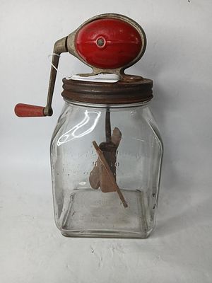 Bullet Top Dazey Butter Churn. No 40, with some surface rusting to lid. No chips or cracks to 