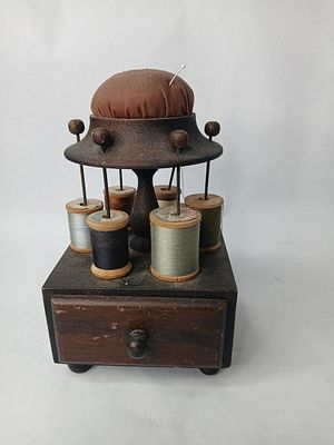 Pin Cushion Antique Sewing Drawer & Spool Holder. Dark walnut wood with drawer and pushion a 