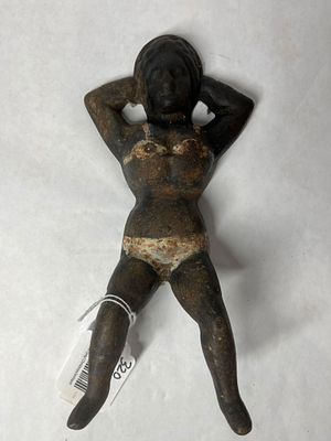 Naughty Nellie Boot Jack. Cast iron 10 inches. Minor surface spotting with paint loss to bikini
