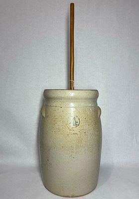 4 Gallon Crock Churn. Wooden paddle and handle. No large chips or cracks. Some crazing shows to 