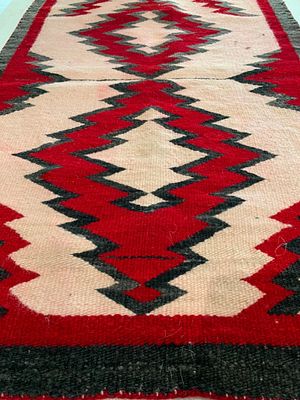Early Navajo Eye Dazzler Wool Saddle Blanket. 38" x 23 1/2", richly hued woven wool, areas of 