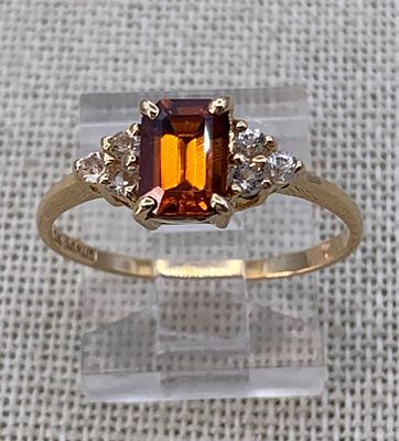 10k Yellow Gold Madeira Citrine and Diamond Ring. 10k hallmark, 7x5mm emerald cut gemstone, 8.5 