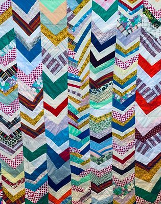Vintage Hand and Machine Stitched Farmhouse Folk Art Chevron Quilt. 86" x 65", vibrant hues in a 