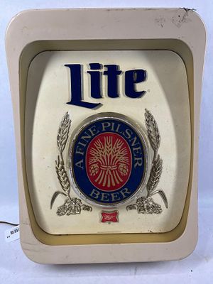 Miller Lite Lighted Beer Sign. Working condition but takes a few seconds to come on. 19x14