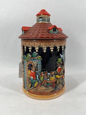 West German Ceramic Tobacco Jar. Featuring a colorful Knight scene. 9 inches tall.