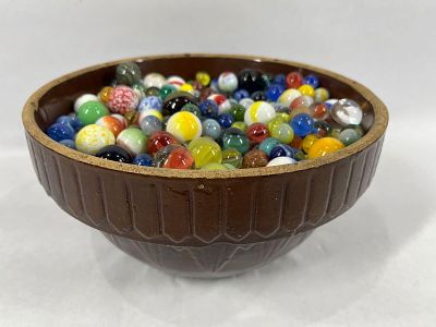 Crock Bowl Full of Early Marbles. Glass and several clay marbles and shooters. Bowl is 10x5