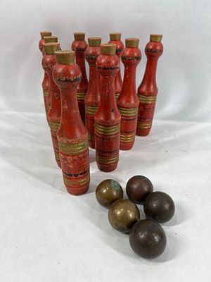 1900s 10 Pin Skittles Game. 10 hand turned and painted wooden pins with 4 solid brass balls. 