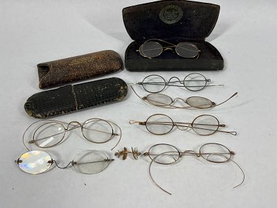 Wire Rim Eyeglasses. 7 pair, including a few cases. These are normally gold or gold filled but 