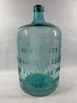 City of Cleveland Ice Delivery Glass Water Jar. 20 inches tall, embossed. Pure distilled water.